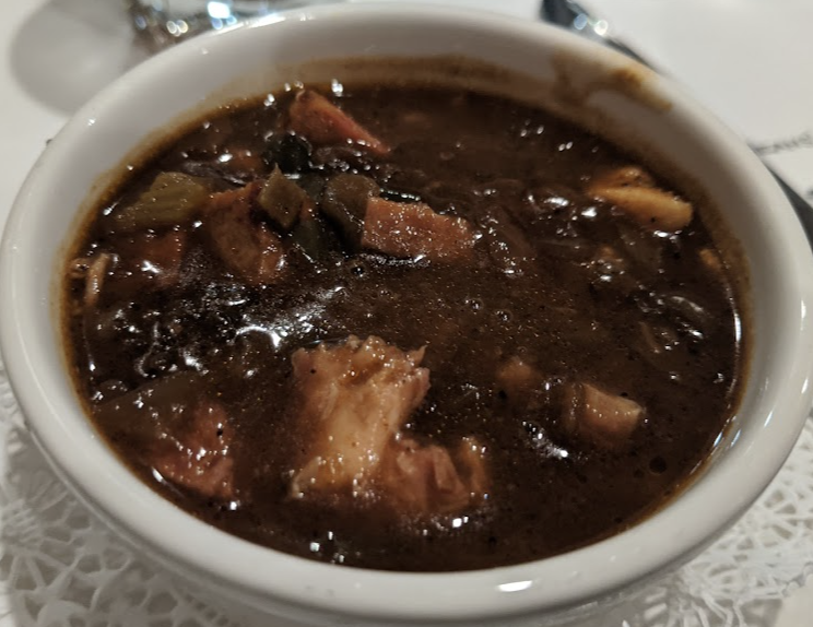 K-Paul's Louisiana Kitchen signature dishes Chicken and Andouille Gumbo 
Pan-Friend Flounder with Crabmeat and Scallop Marigny
Eggplant Pirogue with Seafood Atchafalaya